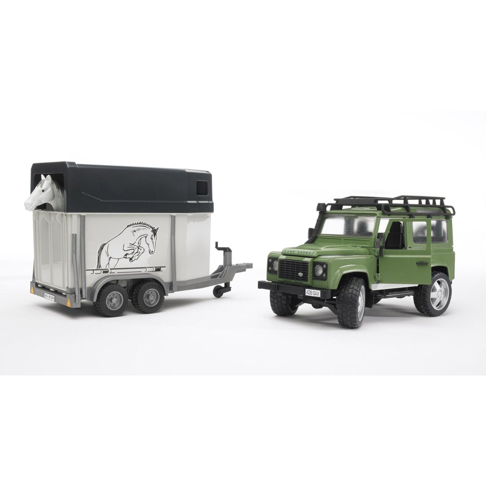 Land Rover Defender St. Wagon with horse trailer and 1 horse